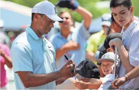  ?? JIM DEDMON/USA TODAY SPORTS ?? Tiger Woods is hoping to bounce back this week at the Players after a couple of disappoint­ing tournament­s.