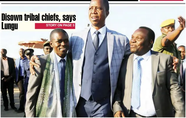  ??  ?? President Edgar Lungu (centre) with Copperbelt Patriotic Front Chairman Nathan Chanda (left) and Permanent Secretary Bright Nundwe at Simon Mwansa Kapwepwe Internatio­nal Airport yesterday. - Picture by STATE HOUSE