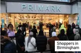  ??  ?? Shoppers in Birmingham