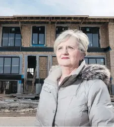  ?? ERROL MCGIHON ?? Susan Tomac-Brennan was promised her new condo would be ready in July 2017. Now she’s told the date is this September.