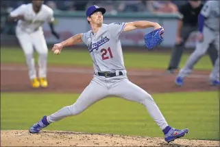  ?? GENE J. PUSKAR — THE ASSOCIATED PRESS ?? Dodgers starting pitcher Walker Buehler threw seven shutout innings Tuesday in L.A.’s win over the Pirates.