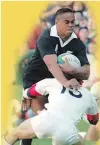  ?? | AP ?? JONAH Lomu steamrolls over England’s fullback Mike Catt to score the opening try in the Rugby World Cup semifinal at Newlands in 1995.