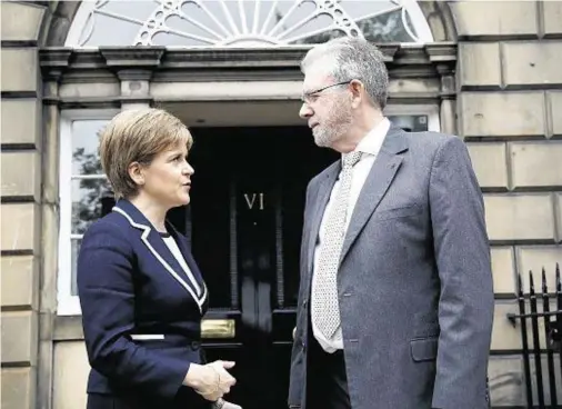  ??  ?? TALKING POINT: First Minister Nicola Sturgeon and new minister Michael Russell, who emphasised the importance of the EU to Scotland