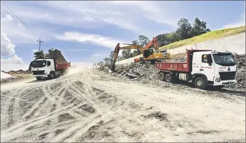  ??  ?? Constructi­on workers carry out land clearance work at one of the WPC 04 sites.