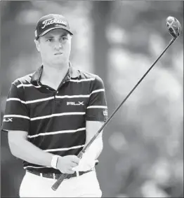  ?? ANDREW REDINGTON/GETTY ?? Justin Thomas shot an opening-round 65 on Thursday to share of the lead at the BMW Championsh­ip. He and Jason Kokrak tied the course record at Medinah Country Club.