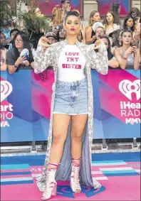  ?? CP PHOTO ?? Lilly Singh arrives on the red carpet at the 2017 Much Music Video Awards in Toronto on June 18. Singh bills herself as “Superwoman,” but she’s adored by fans as the girl next door.