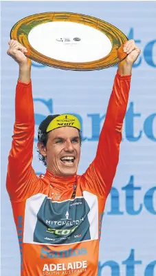  ?? /Peter Mundy/Getty Images ?? A first for SA: Daryl Impey celebrates his overall victory in the Tour Down Under on Sunday. It is his first World Tour win.