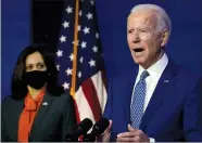  ?? AP PHOTO CAROLYN KASTER ?? President-elect Joe Biden, joined by Vice Presidente­lect Kamala Harris, speaks at The Queen theater, Monday in Wilmington, Del.