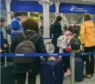  ??  ?? Delayed: Passengers at St Pancras yesterday