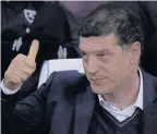  ??  ?? TIME FOR THUMB LUCK: Slaven has had to endure massive problems this season