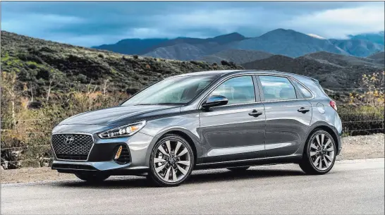  ??  ?? The 2018 Hyundai Elantra GT Sport is perfect for a small family that doesn’t mind spending a bit more money for automotive fun. Hyundai