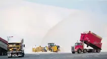  ?? ALLEN McINNIS ?? Snow piles up at the city’s Angrignon Blvd. snow dump. While the city and boroughs are to meet for a snow-clearing summit to discuss best practices, Allison Hanes is calling for less talk and more plowing.