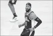  ?? MARCIO JOSE SANCHEZ — THE ASSOCIATED PRESS ?? Los Angeles Clippers forward Marcus Morris Sr. reacts after scoring against the Los Angeles Lakers during the first half Sunday in Los Angeles.