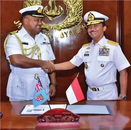  ?? Photo: Embassy of Indonesia ?? Fijian Navy Commander, Captain (Navy) Humphrey Tawake with Indonesian National Armed Forces Kasal Admiral Siwi Sukma Adji.