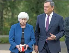  ?? Bloomberg ?? Janet Yellen and Mario Draghi spoke against protection­ism and issues of regulation­s at the Jackson Hole symposium