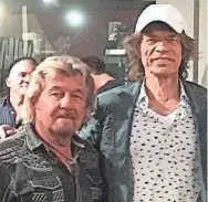  ?? JERRY PHILLIPS ?? Music producer (and son of Sam Phillips) Jerry Phillips and Mick Jagger took this picture together Sept. 12 at the Sam Phillips Recording Service on Madison Avenue.