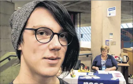  ?? FRAM DINSHAW/ TRURO NEWS PHOTOS ?? LEFT: Grade 12 student Denison Percey is hoping to pursue a career in IT. He came to the NSCC open house from his home in Elmsdale to see what was o ered at the Truro campus.BELOW: NSCC College principal Lech Krzywonos chats with Mollie Macburnie from Debert. Hundreds of school students and adults seeking to further their education came to the NSCC’S Truro campus to learn more about the courses o ered and college life.