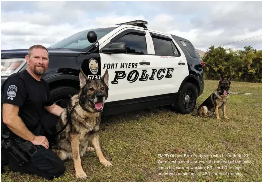  ??  ?? FMPD Officer Ezra Padgham with his retired K9, Wotan, who died last year. At the rear of the police car is his current working K9, Lord. The dogs undergo a minimum of 480 hours of training.