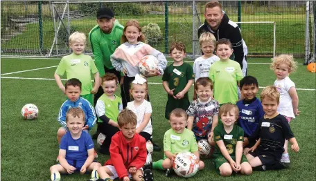  ??  ?? Young soccer players with coaches Gary Keane and Anthony O’Leary at the Killarney Celtic Tiny Tots Soccer and continues for a number of weeks on Saturday’s at 3pm at Celtic Park, Killarney. Photo by Michelle Cooper Galvin