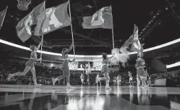  ?? Mark Mulligan / Staff file photo ?? University of Houston cheerleade­rs fire up the crowd before a game in 2020. On Saturday, the Cougars will play in the Final Four for the first time since 1984.