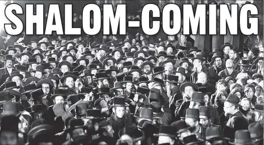  ??  ?? MEATPACKED: Thousands mass outside the Borough Park home of Sholom Rubashkin’s parents to greet him (below) and celebrate his release.