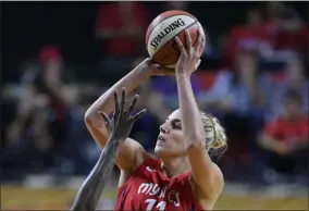  ?? NICK WASS - THE ASSOCIATED PRESS ?? FILE - In this Sept. 12, 2018, file photo, Washington Mystics forward Elena Delle Donne (11) shoots against the Seattle Storm during the second half of Game 3of the WNBA basketball finals, in Fairfax, Va.