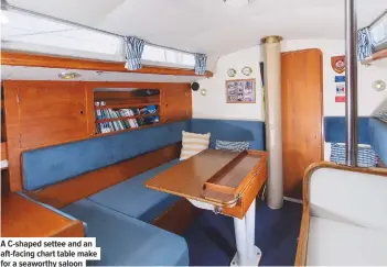  ??  ?? A C-shaped settee and an aft-facing chart table make for a seaworthy saloon