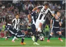  ??  ?? Double...Juventus’ Paulo Dybala (right) in action against Lazio in the Italian Cup Final