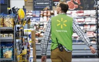  ?? MARK LENNIHAN / AP ?? Walmart Inc. reported results Thursday, and shares rose as much as 7%, the most intraday since last August. Comparable sales excluding fuel for Walmarts in the U.S. rose 2.8% in the second quarter.