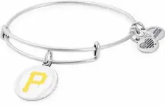  ??  ?? MLB color infusion bangle with Pirates charm ($38) by ALEX AND ANI.