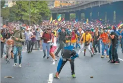  ??  ?? PROTESTAS. Manifestan­tes opositores en las últimas marchas.