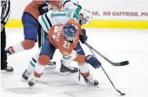  ?? LYNNE SLADKY/AP ?? Florida’s Vincent Trocheck (21) is checked from behind by Dallas’ Tyler Seguin (91) early in Tuesday night’s game in Sunrise.