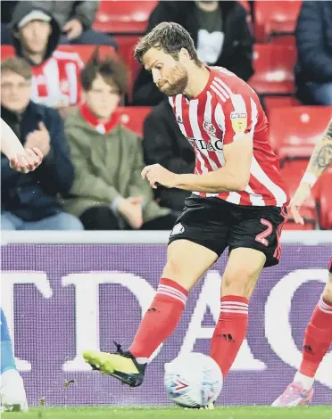  ??  ?? Sunderland defender Adam Matthews goes on the attack against Peterborou­gh, with Chris Maguire not to far away from the action.