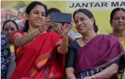  ?? — BUNNY SMITH ?? NCP MP Supriya Sule and activist Ranjana Kumari take a selfie during a protest for Women’s Reservatio­n Bill at Jantar Mantar in New Delhi on Monday.