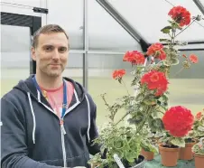  ??  ?? Ian Patterson, of the North East Autism Society, with the new flower.