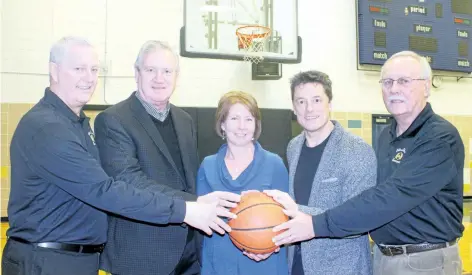  ?? BERND FRANKE/STANDARD STAFF ?? From left, co-convener Don Larman, Mountainvi­ew Homes chief financial officer Rick Podrebarac, Notre Dame vice-principal Colleen Quinn-Boyer, Mountainvi­ew Homes operations manager Mike Memme and co-convener John Witlib promote the 63rd Tribune Boys...