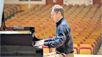  ??  ?? Masterly: pianist Steven Osborne rehearses ahead of the second BBC Radio 3 Lockdown Live at Glasgow City Halls