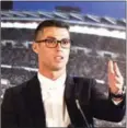  ?? AFP ?? Cristiano Ronaldo speaks during the official presentati­on of his contract renewal on Monday.
