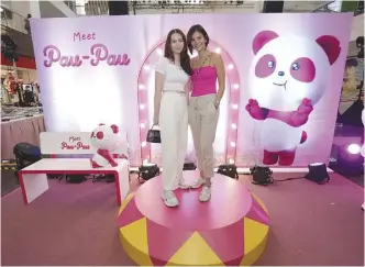  ?? ?? Fitness trainer Joanne Villablanc­a (right) with her daughter at the foodpanda 8th birthday event at Glorietta 4