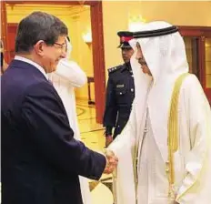  ??  ?? Forging stronger bonds Prince Khalifa receiving Ahmet Davutoglu. Bahrain is looking forward to broadening its relations with Turkey.
Courtesy: Bahrain News Agency