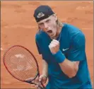  ?? The Associated Press ?? Canada’s Denis Shapovalov clenches his fist after defeating John Millman of Australia during their first-round match at the French Open in Paris, France, on Tuesday.