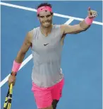  ?? AP PHOTO ?? ROLLING AGAIN: Rafael Nadal celebrates after defeating Diego Schwartzma­n in the fourth round of the Australian Open yesterday.