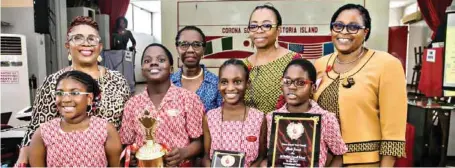  ??  ?? From left (back row): The Director of Education, Corona Schools, Mrs. Amelia Dafeta; Trustee and member, Governing Board, Corona Schools Trust Council, Dr. Myma Belo-Osagie, Chief Executive Officer, Corona Schools Trust Council, Mrs. Adeyoyin Adesina,...