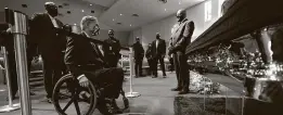  ?? David J. Phillip / Associated Press file photo ?? Gov. Greg Abbott passes by the casket of George Floyd during a public visitation for Floyd at the Fountain of Praise church on June 8 in Houston.