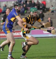  ??  ?? Eoghan Nolan (Shelmalier­s) evades Gusserane captain Liam Dillon.