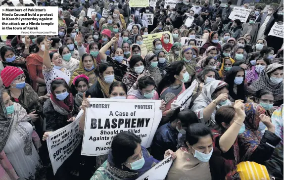  ?? Fareed Khan/Associated Press ?? Members of Pakistan’s Hindu Council hold a protest in Karachi yesterday against the attack on a Hindu temple in the town of Karak