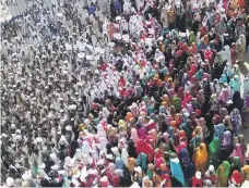  ?? AFP ?? Backers of Sudanese leader Omar Al Bashir gather in the eastern city of Kassala to oppose attempts to force him from office