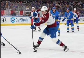  ?? DILIP VISHWANAT — GETTY IMAGES ?? The Avalanche’s Bowen Byram scores a goal against the St. Louis Blues in the second period Saturday at Enterprise Center in St. Louis.