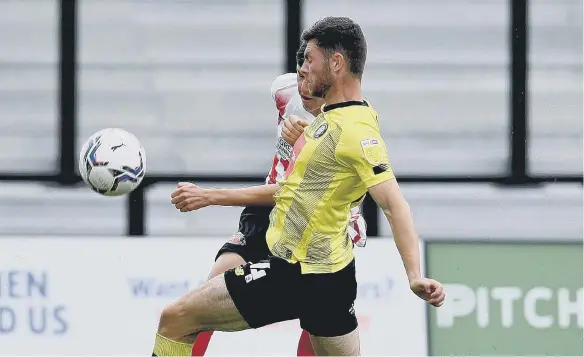  ??  ?? An Ellis Taylor cross leads to Sunderland’s fourth goal at Harrogate