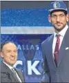  ?? FILE PHOTO/NBA.COM ?? Satnam Singh is congratula­ted by National Basketball Associatio­n deputy commission­er Mark Tatum after being selected by the Dallas Mavericks with the 52nd overall pick of the 2015 NBA Draft. Singh has signed a one-year contract with the National Basketball League of Canada’s St. John’s Edge.